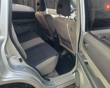 Серый Ниссан ИксТрейл, объемом двигателя 2.18 л и пробегом 337 тыс. км за 5950 $, фото 9 на Automoto.ua