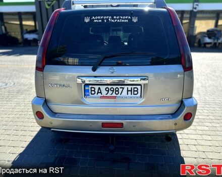 Серый Ниссан ИксТрейл, объемом двигателя 2.2 л и пробегом 319 тыс. км за 7200 $, фото 4 на Automoto.ua