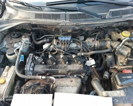 Серый Ниссан ИксТрейл, объемом двигателя 2 л и пробегом 242 тыс. км за 4300 $, фото 6 на Automoto.ua