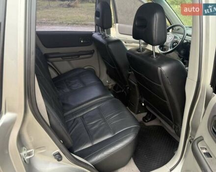 Серый Ниссан ИксТрейл, объемом двигателя 2.5 л и пробегом 265 тыс. км за 6000 $, фото 14 на Automoto.ua