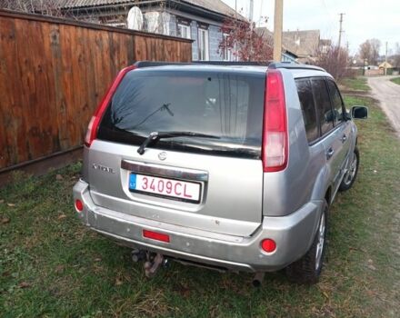 Серый Ниссан ИксТрейл, объемом двигателя 2 л и пробегом 242 тыс. км за 4300 $, фото 2 на Automoto.ua