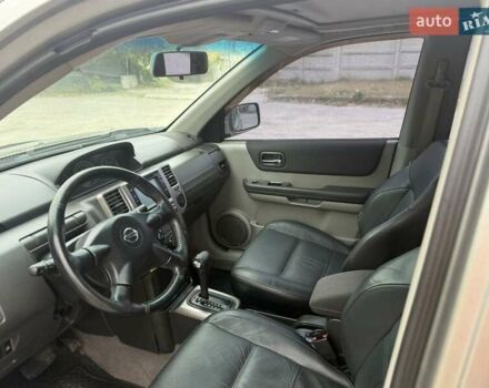 Серый Ниссан ИксТрейл, объемом двигателя 2.5 л и пробегом 265 тыс. км за 6000 $, фото 12 на Automoto.ua