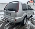Сірий Ніссан ІксТрейл, об'ємом двигуна 2.18 л та пробігом 247 тис. км за 6800 $, фото 4 на Automoto.ua