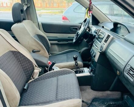 Серый Ниссан ИксТрейл, объемом двигателя 2.2 л и пробегом 100 тыс. км за 3450 $, фото 7 на Automoto.ua