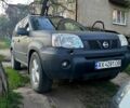 Сірий Ніссан ІксТрейл, об'ємом двигуна 2.4 л та пробігом 400 тис. км за 5000 $, фото 1 на Automoto.ua