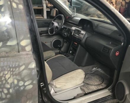 Серый Ниссан ИксТрейл, объемом двигателя 2.2 л и пробегом 220 тыс. км за 2800 $, фото 2 на Automoto.ua