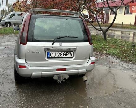 Серый Ниссан ИксТрейл, объемом двигателя 2.2 л и пробегом 391 тыс. км за 5000 $, фото 2 на Automoto.ua