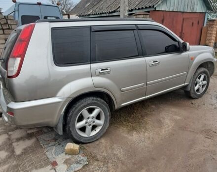 Серый Ниссан ИксТрейл, объемом двигателя 2 л и пробегом 290 тыс. км за 4950 $, фото 2 на Automoto.ua