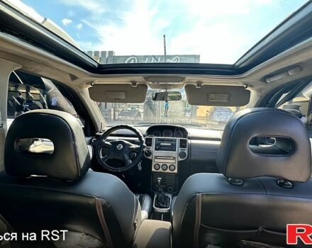 Серый Ниссан ИксТрейл, объемом двигателя 2.2 л и пробегом 319 тыс. км за 7200 $, фото 5 на Automoto.ua