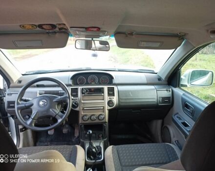 Серый Ниссан ИксТрейл, объемом двигателя 2 л и пробегом 242 тыс. км за 4300 $, фото 5 на Automoto.ua