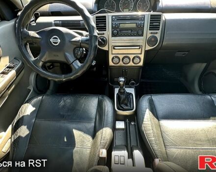 Серый Ниссан ИксТрейл, объемом двигателя 2.2 л и пробегом 319 тыс. км за 7200 $, фото 6 на Automoto.ua