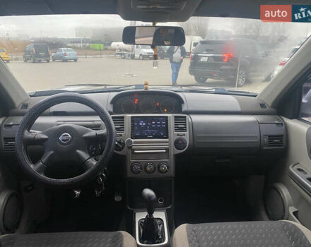 Серый Ниссан ИксТрейл, объемом двигателя 2 л и пробегом 246 тыс. км за 4499 $, фото 17 на Automoto.ua