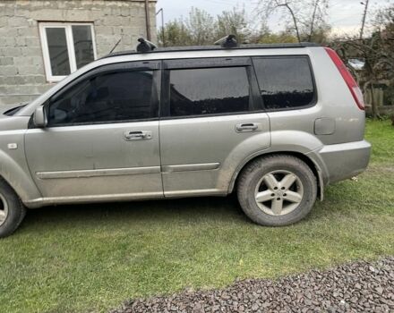 Серый Ниссан ИксТрейл, объемом двигателя 2.5 л и пробегом 299 тыс. км за 4600 $, фото 2 на Automoto.ua