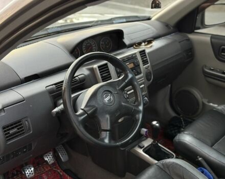 Серый Ниссан ИксТрейл, объемом двигателя 2 л и пробегом 160 тыс. км за 7000 $, фото 10 на Automoto.ua