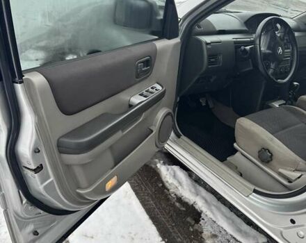 Сірий Ніссан ІксТрейл, об'ємом двигуна 2.18 л та пробігом 247 тис. км за 6800 $, фото 13 на Automoto.ua