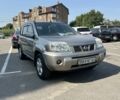 Сірий Ніссан ІксТрейл, об'ємом двигуна 2.5 л та пробігом 300 тис. км за 5500 $, фото 4 на Automoto.ua