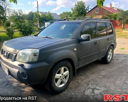 Сірий Ніссан ІксТрейл, об'ємом двигуна 2.4 л та пробігом 400 тис. км за 5000 $, фото 3 на Automoto.ua
