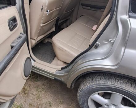 Серый Ниссан ИксТрейл, объемом двигателя 2 л и пробегом 290 тыс. км за 4950 $, фото 8 на Automoto.ua