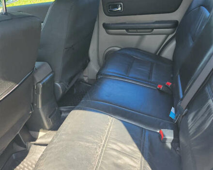 Серый Ниссан ИксТрейл, объемом двигателя 2.18 л и пробегом 297 тыс. км за 6000 $, фото 6 на Automoto.ua