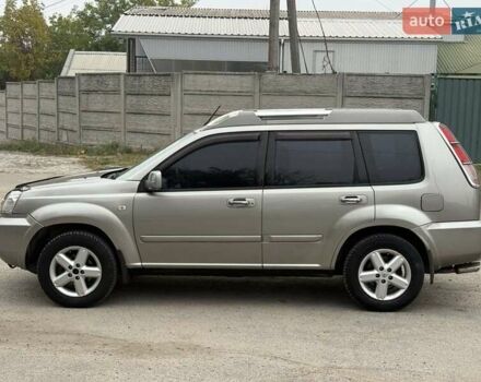 Серый Ниссан ИксТрейл, объемом двигателя 2.5 л и пробегом 265 тыс. км за 6000 $, фото 3 на Automoto.ua