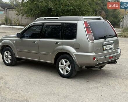 Серый Ниссан ИксТрейл, объемом двигателя 2.5 л и пробегом 265 тыс. км за 6000 $, фото 5 на Automoto.ua