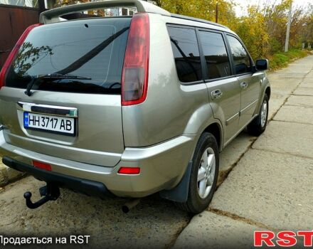 Серый Ниссан ИксТрейл, объемом двигателя 2.2 л и пробегом 240 тыс. км за 6700 $, фото 4 на Automoto.ua