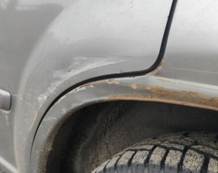 Серый Ниссан ИксТрейл, объемом двигателя 2 л и пробегом 297 тыс. км за 4500 $, фото 2 на Automoto.ua