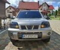 Сірий Ніссан ІксТрейл, об'ємом двигуна 2 л та пробігом 270 тис. км за 8599 $, фото 1 на Automoto.ua