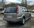 Серый Ниссан ИксТрейл, объемом двигателя 2 л и пробегом 305 тыс. км за 5100 $, фото 2 на Automoto.ua