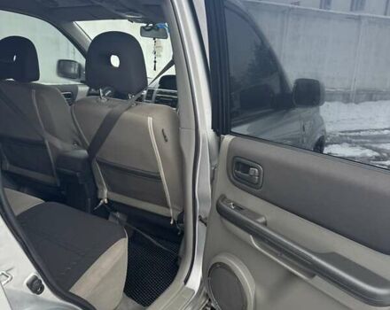 Сірий Ніссан ІксТрейл, об'ємом двигуна 2.18 л та пробігом 247 тис. км за 6800 $, фото 14 на Automoto.ua