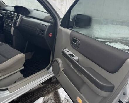 Сірий Ніссан ІксТрейл, об'ємом двигуна 2.18 л та пробігом 247 тис. км за 6800 $, фото 15 на Automoto.ua