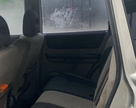 Серый Ниссан ИксТрейл, объемом двигателя 2 л и пробегом 246 тыс. км за 4499 $, фото 15 на Automoto.ua