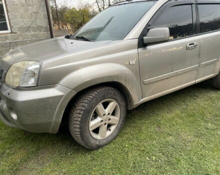 Серый Ниссан ИксТрейл, объемом двигателя 2.5 л и пробегом 299 тыс. км за 4600 $, фото 3 на Automoto.ua