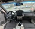 Серый Ниссан ИксТрейл, объемом двигателя 2 л и пробегом 305 тыс. км за 5100 $, фото 5 на Automoto.ua