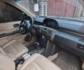 Серый Ниссан ИксТрейл, объемом двигателя 2 л и пробегом 290 тыс. км за 4950 $, фото 4 на Automoto.ua