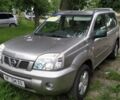 Серый Ниссан ИксТрейл, объемом двигателя 2 л и пробегом 300 тыс. км за 230000 $, фото 1 на Automoto.ua