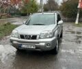 Серый Ниссан ИксТрейл, объемом двигателя 2.2 л и пробегом 391 тыс. км за 5000 $, фото 1 на Automoto.ua
