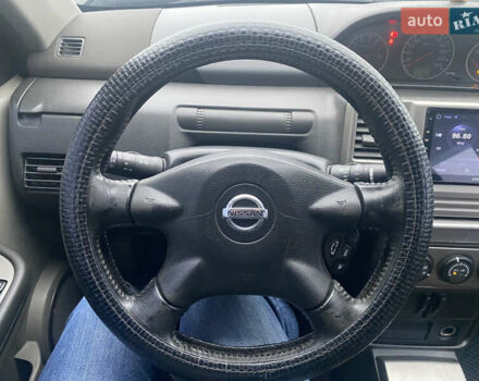 Серый Ниссан ИксТрейл, объемом двигателя 2 л и пробегом 246 тыс. км за 4499 $, фото 21 на Automoto.ua