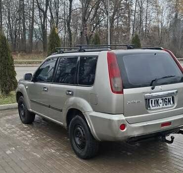 Сірий Ніссан ІксТрейл, об'ємом двигуна 2.2 л та пробігом 327 тис. км за 3071 $, фото 4 на Automoto.ua