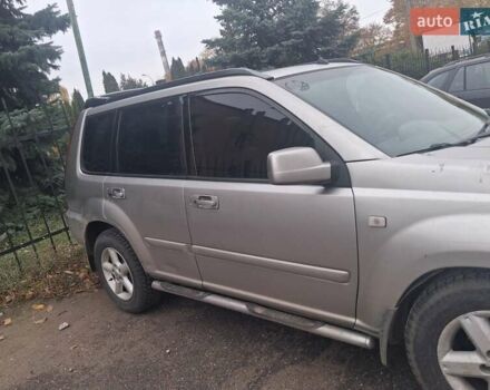 Серый Ниссан ИксТрейл, объемом двигателя 2.18 л и пробегом 273 тыс. км за 5800 $, фото 4 на Automoto.ua