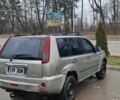 Серый Ниссан ИксТрейл, объемом двигателя 2.2 л и пробегом 327 тыс. км за 3077 $, фото 4 на Automoto.ua