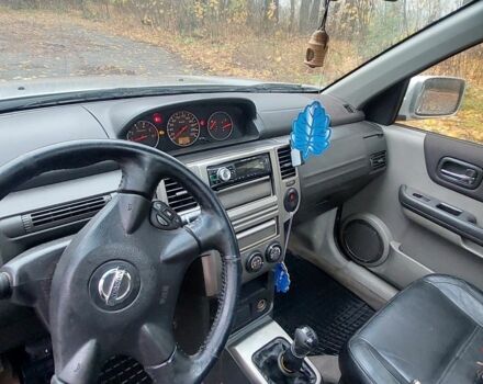 Серый Ниссан ИксТрейл, объемом двигателя 2 л и пробегом 450 тыс. км за 4042 $, фото 2 на Automoto.ua