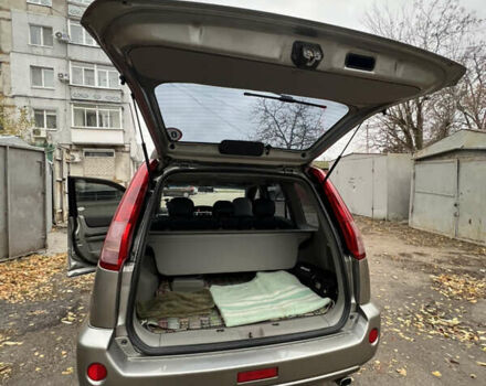 Серый Ниссан ИксТрейл, объемом двигателя 2 л и пробегом 170 тыс. км за 7400 $, фото 13 на Automoto.ua