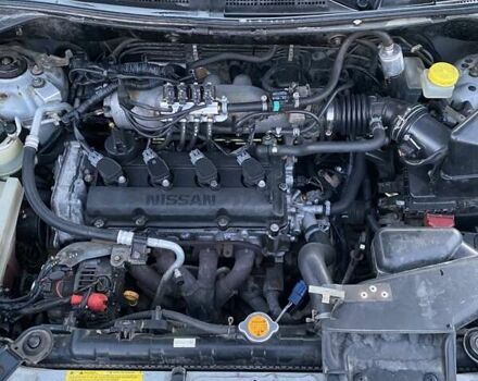 Серый Ниссан ИксТрейл, объемом двигателя 2.49 л и пробегом 261 тыс. км за 5700 $, фото 12 на Automoto.ua