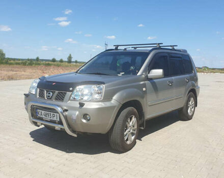 Сірий Ніссан ІксТрейл, об'ємом двигуна 2 л та пробігом 396 тис. км за 6499 $, фото 3 на Automoto.ua