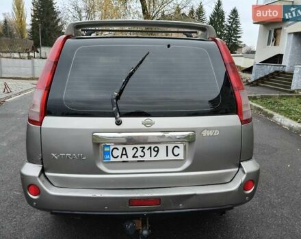 Серый Ниссан ИксТрейл, объемом двигателя 2 л и пробегом 270 тыс. км за 4196 $, фото 6 на Automoto.ua