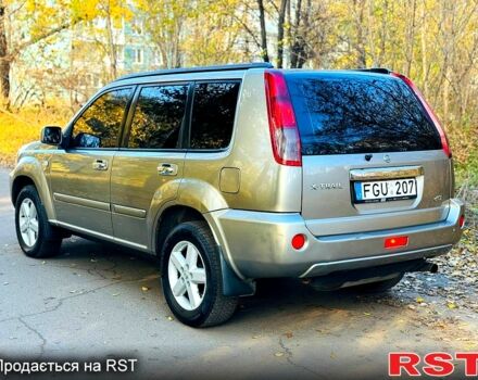 Серый Ниссан ИксТрейл, объемом двигателя 2.2 л и пробегом 238 тыс. км за 4250 $, фото 2 на Automoto.ua