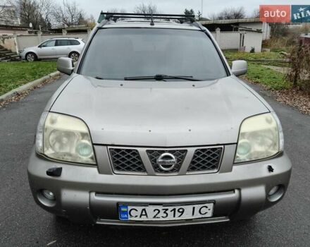 Серый Ниссан ИксТрейл, объемом двигателя 2 л и пробегом 270 тыс. км за 4196 $, фото 2 на Automoto.ua