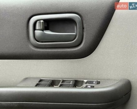 Серый Ниссан ИксТрейл, объемом двигателя 2.18 л и пробегом 280 тыс. км за 5850 $, фото 50 на Automoto.ua