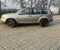Серый Ниссан ИксТрейл, объемом двигателя 2.2 л и пробегом 300 тыс. км за 4999 $, фото 4 на Automoto.ua